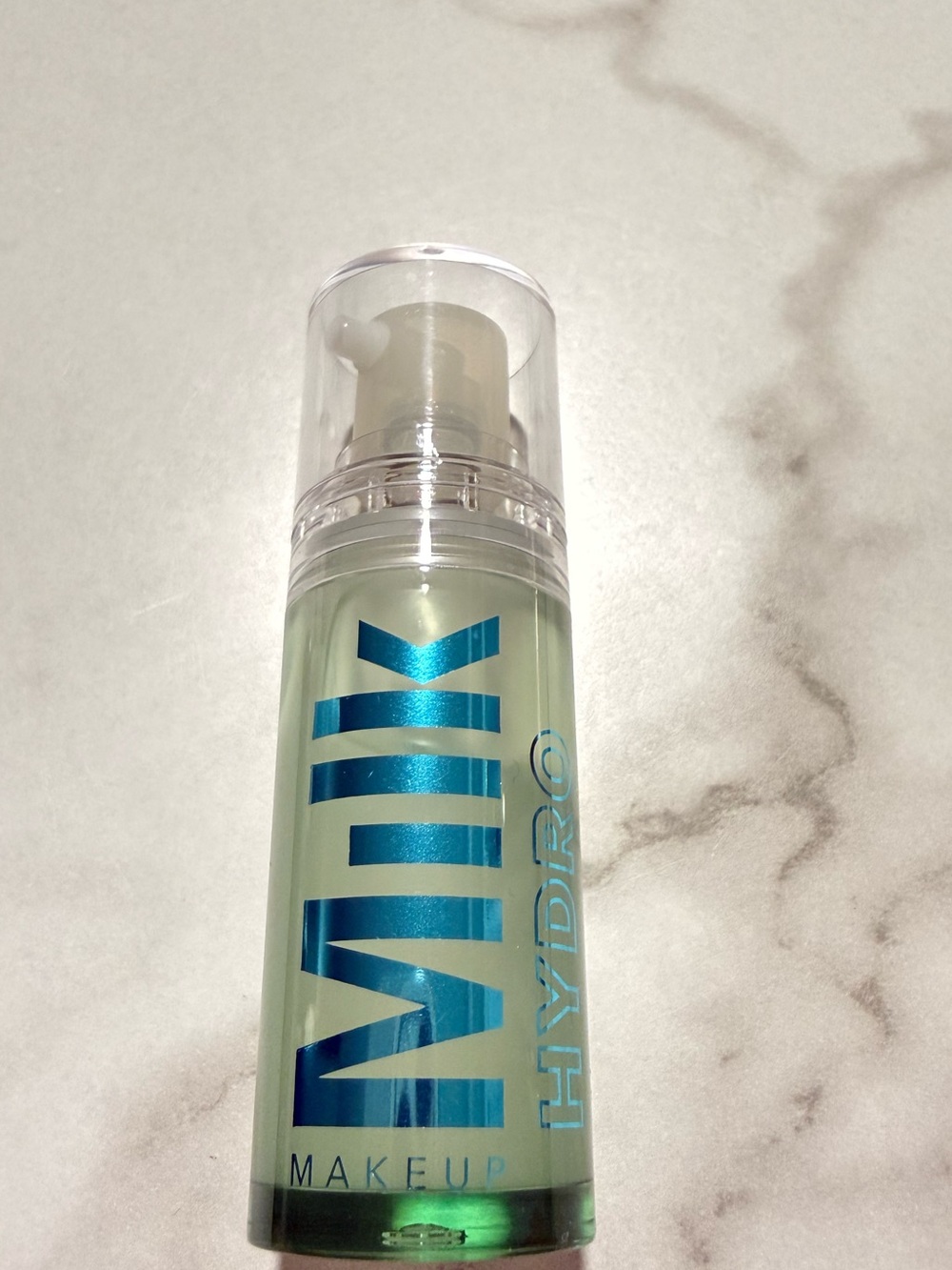 Milk Makeup Hydro Grip Primer - Light Green Bottle with Blue Logo